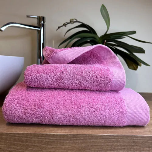 Coppia di Asciugamani in Spugna Mercerizzata 108 Rosa vivo | ArredoCasa Online tutto il tessile per la tua casa.