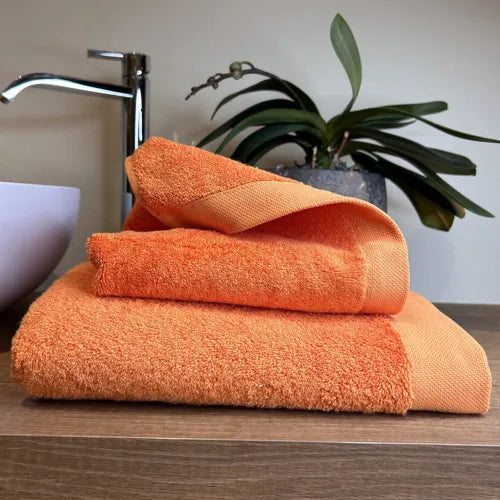 Coppia di Asciugamani in Spugna Mercerizzata Mandarino | ArredoCasa Online tutto il tessile per la tua casa.