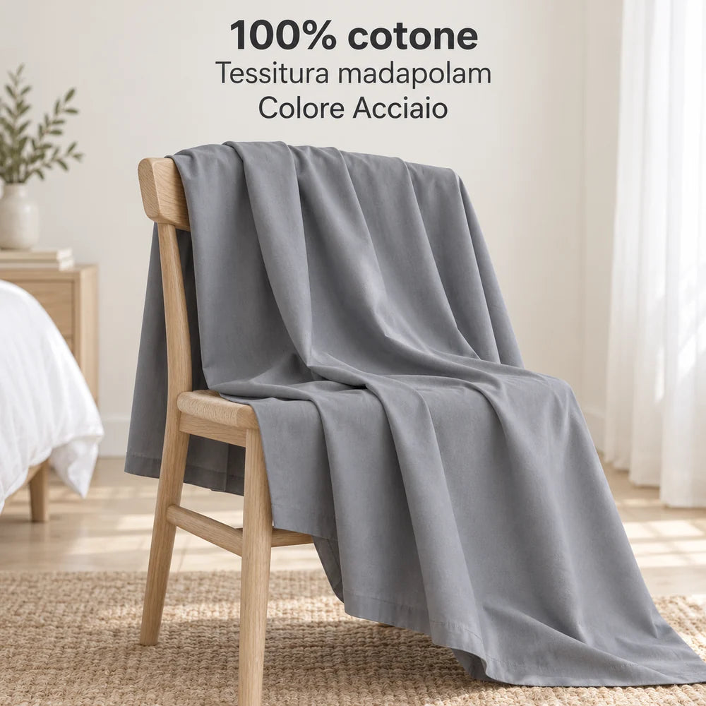 Lenzuolo sopra Acciaio in madapolam 100% cotone, drappeggiato su una sedia. Foto illustrativa: Acciaio / Matrimoniale. Guanciali e arredi esclusi.