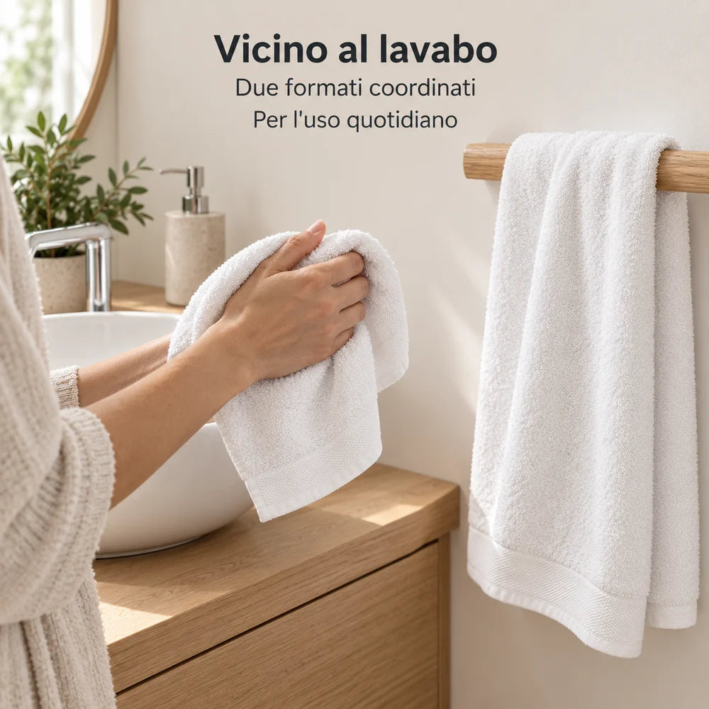 Ospite Bianco tra le mani e viso Bianco sul portasciugamani. Foto illustrativa: Bianco. Arredi e accessori esclusi.