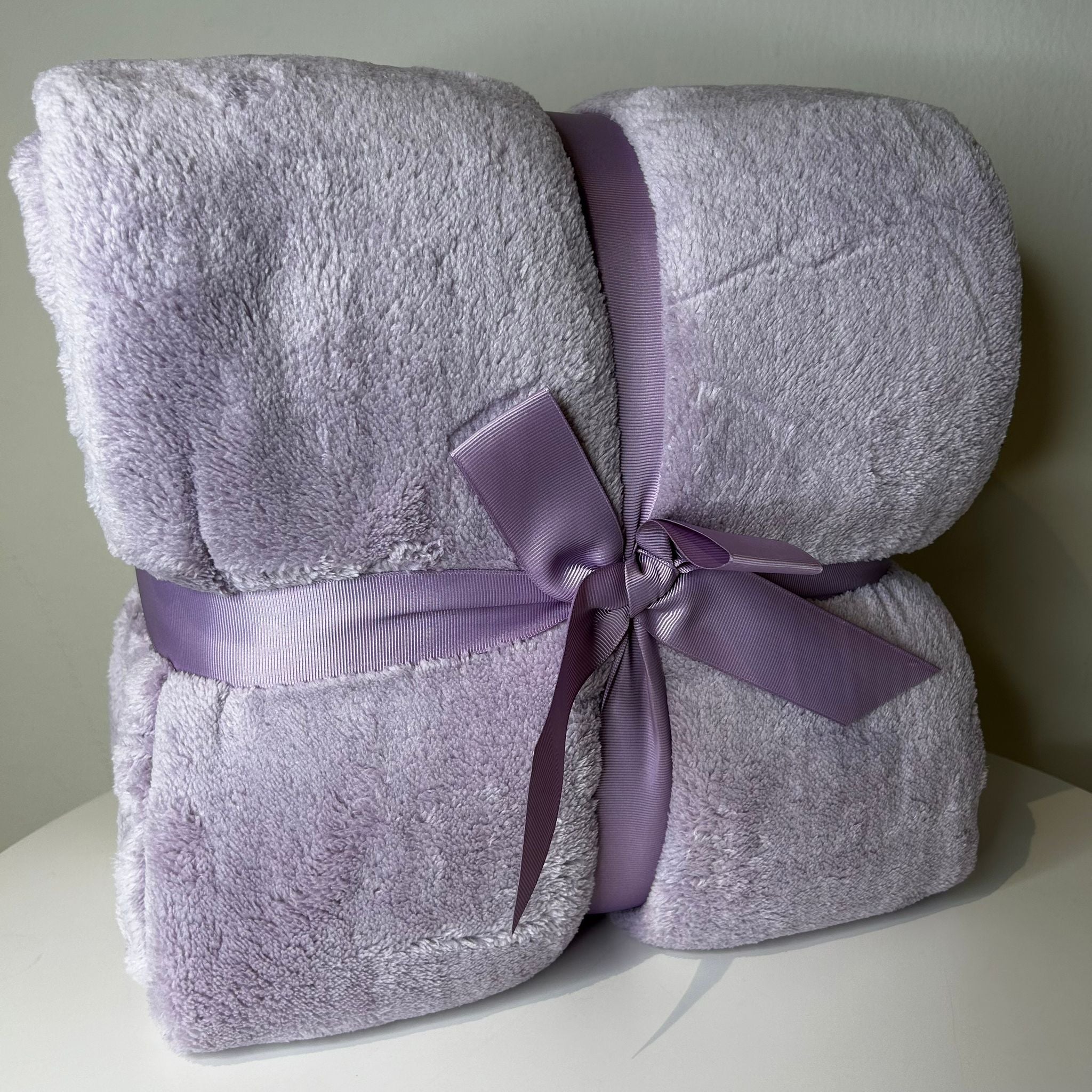 Plaid Coccola Lilla | ArredoCasa Online tutto il tessile per la tua casa.